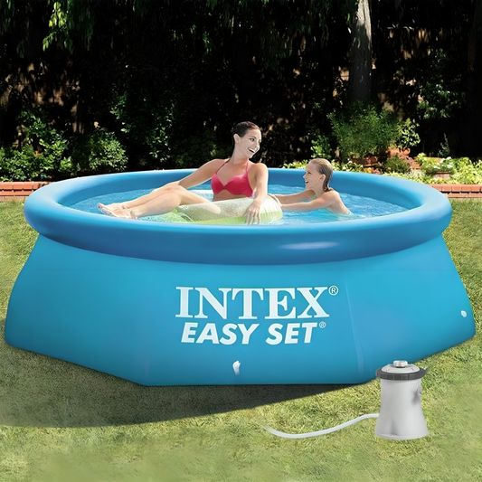 Intex Easy Set inflatable pool with two people in it on grass
