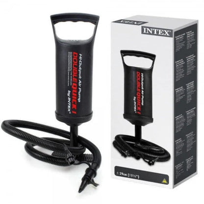 Black air pump with coiled hose next to its packaging box on a white background