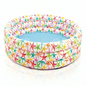 Inflatable pool with colorful starfish pattern on a white background