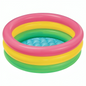 Inflatable children's pool with pink, yellow, and green rings on a white background
