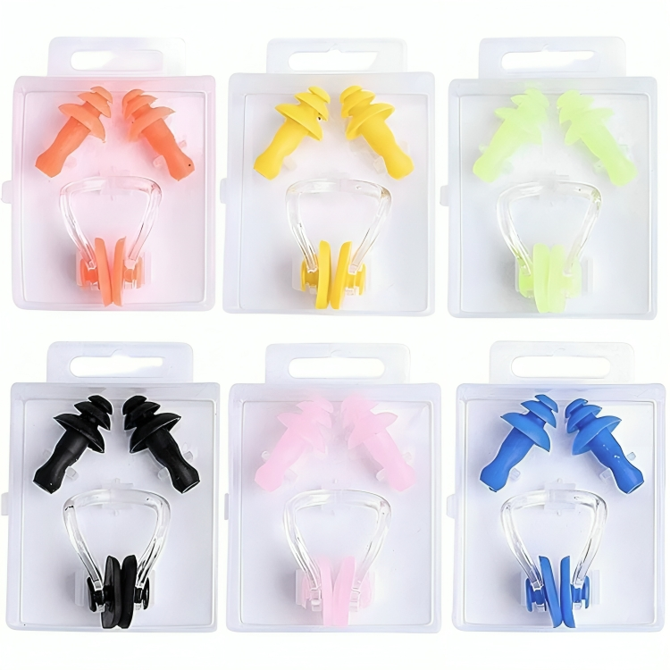 Set of colorful earplugs in clear packaging on a white background