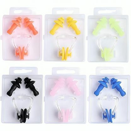 Set of colorful earplugs in clear packaging on a white background