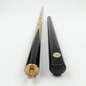Two black and gold pool cues on a white background