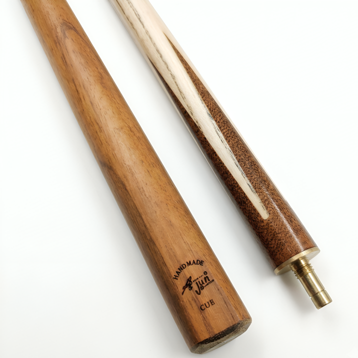 Two wooden pool cues on a white background