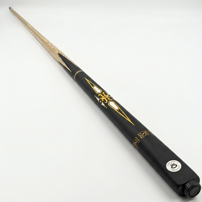 Black pool cue with gold accents on a white background